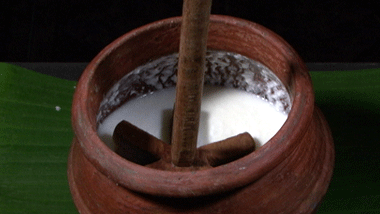 Traditional way of extracting Butter from Curd